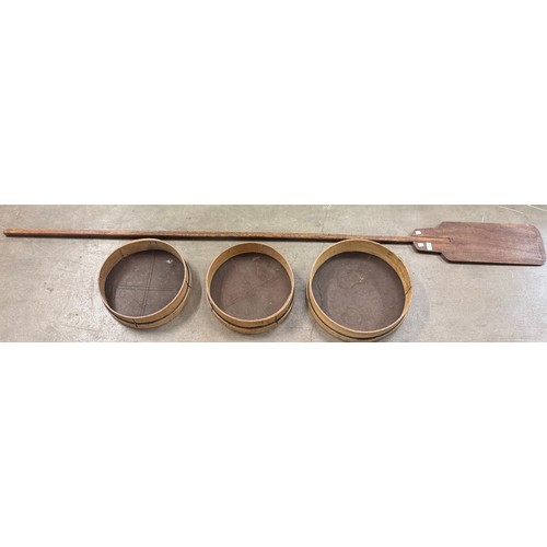 250 - Three pine bakers sieves and a bakers paddle