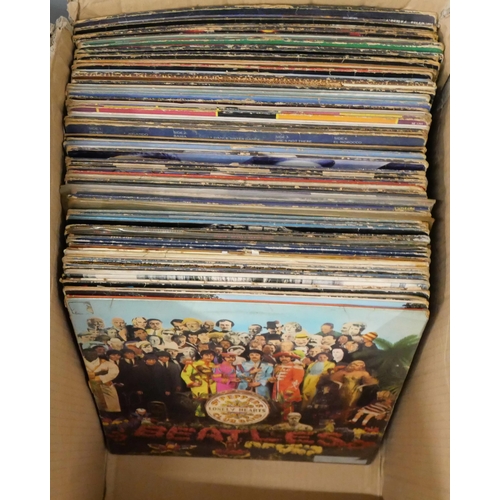 877 - A collection of LP records including The Beatles, AC/DC, ZZ Top, Lynyrd Skynyrd, White Snake, Deep P... 