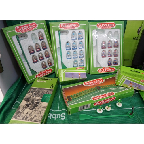 878 - A collection of subbuteo teams, scoreboard inserts, accessories, etc.