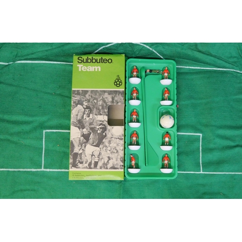 878 - A collection of subbuteo teams, scoreboard inserts, accessories, etc.