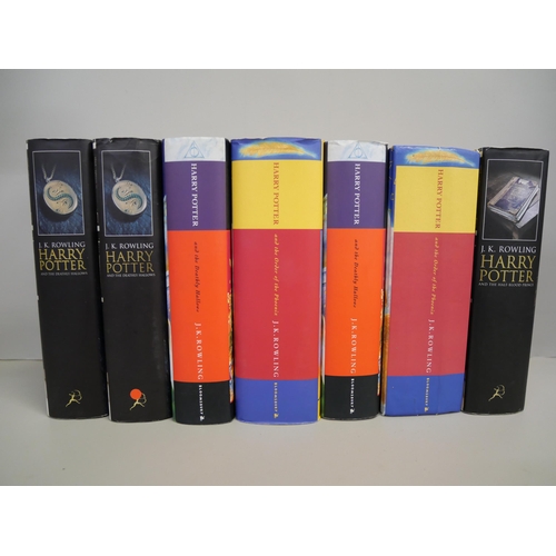 884 - A collection of seven Harry Potter books, all first editions