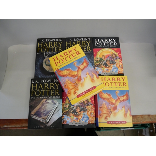 884 - A collection of seven Harry Potter books, all first editions