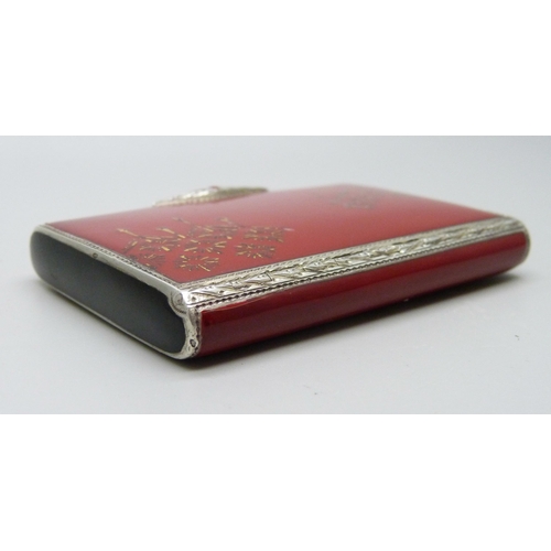 946 - An Austrian sterling silver P.H Vogel Art Deco card case in bright red enamel with black sides, gilt... 