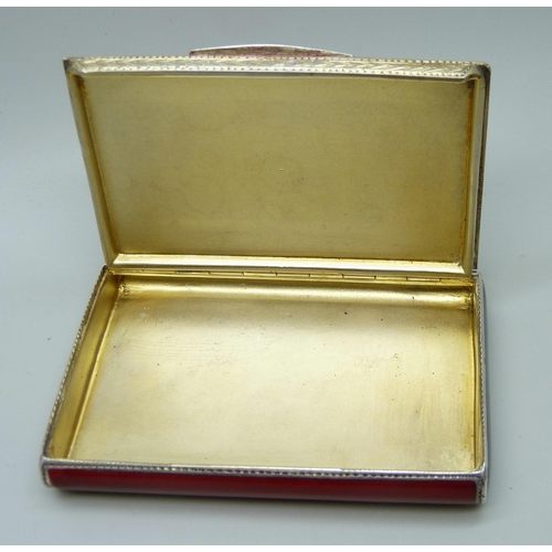 946 - An Austrian sterling silver P.H Vogel Art Deco card case in bright red enamel with black sides, gilt... 