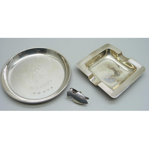 947 - A silver napkin holder, Birmingham 1911, a silver dish and a silver ash tray, 70g total