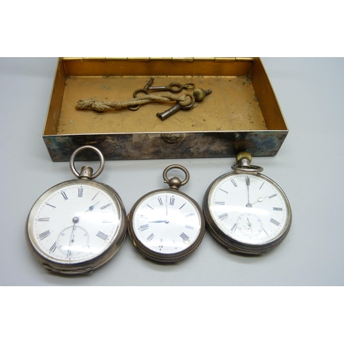 963 - A silver pocket watch, a fine silver fob watch and one other pocket watch in a tin