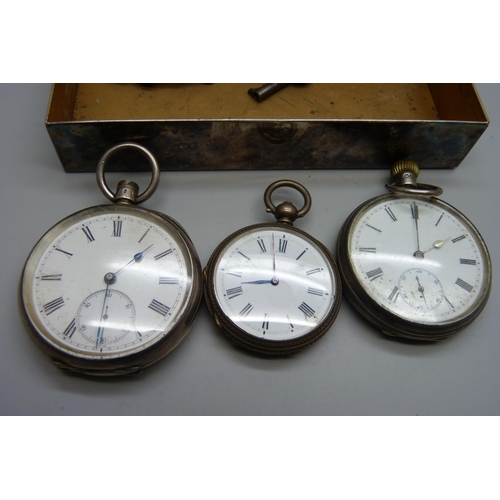 963 - A silver pocket watch, a fine silver fob watch and one other pocket watch in a tin