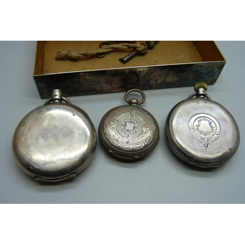 963 - A silver pocket watch, a fine silver fob watch and one other pocket watch in a tin