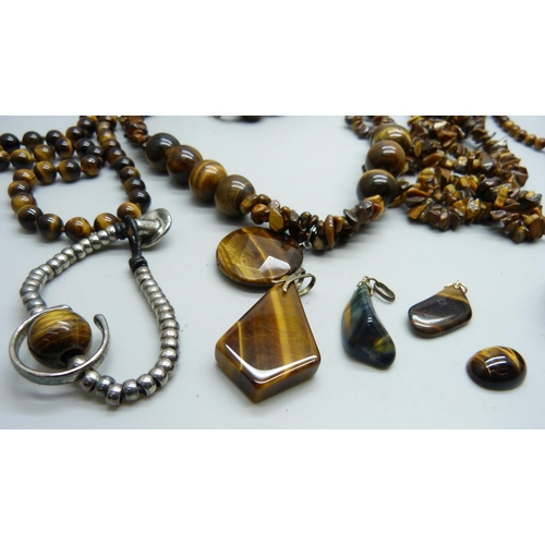 965 - A collection of tiger's eye jewellery including pendants, necklaces and bracelets