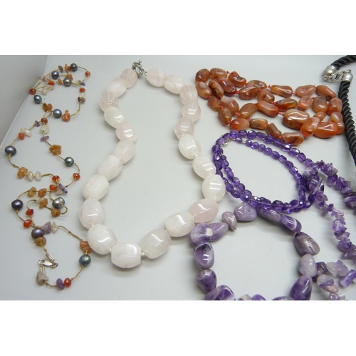 966 - A collection of gemstone jewellery including rose quartz, amethyst (one with silver clasp), agate, e... 