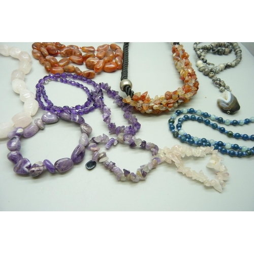 966 - A collection of gemstone jewellery including rose quartz, amethyst (one with silver clasp), agate, e... 