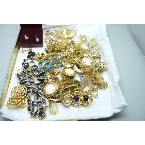 973 - A collection of gold tone jewellery including some named, Joan Rivers and Napier included