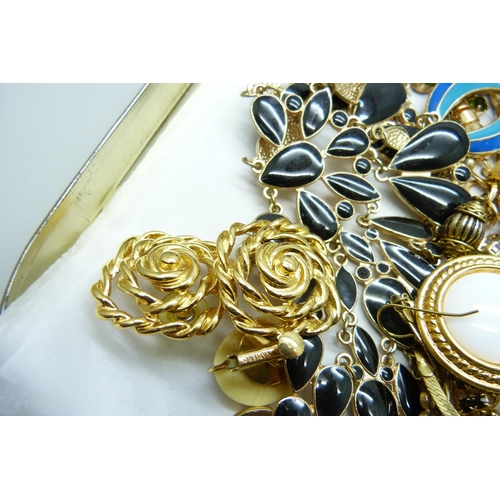 973 - A collection of gold tone jewellery including some named, Joan Rivers and Napier included