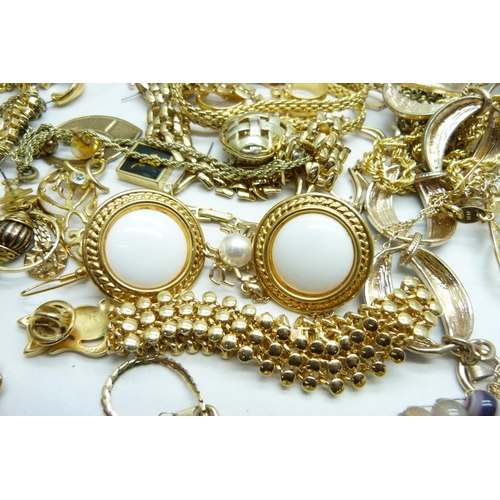 973 - A collection of gold tone jewellery including some named, Joan Rivers and Napier included