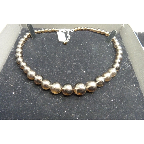 974 - A collection of silver and smokey quartz jewellery including a necklace, bracelet and earrings from ... 