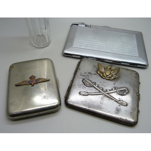 975 - A silver topped glass bottle, two cigarette cases, RAF and US cavalry and a combination lighter/ciga... 