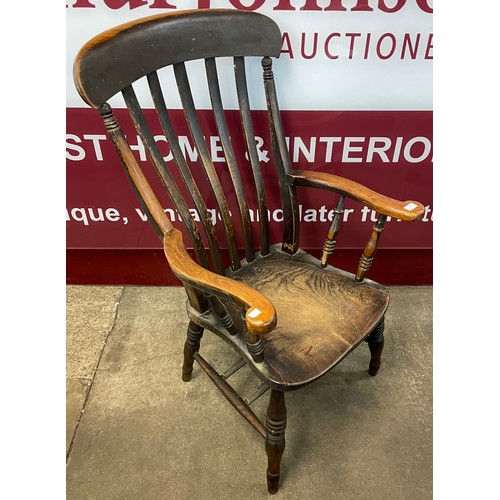 138 - A Victorian elm and beech farmhouse armchair