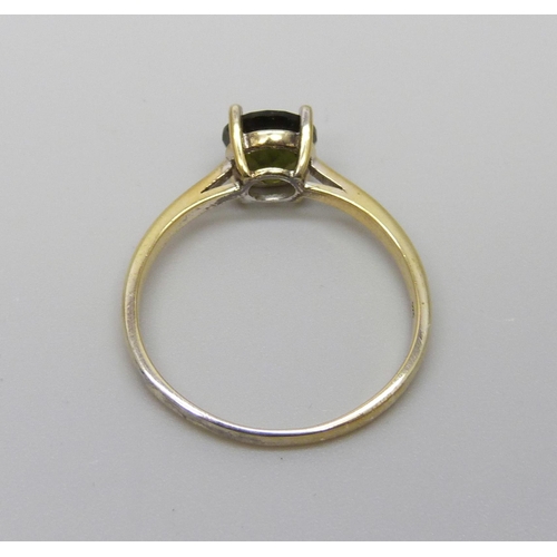 989 - A silver gilt green moldavite solitaire ring, S