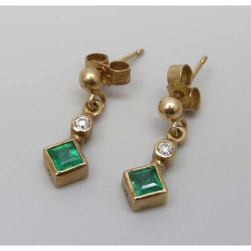 991 - A pair of yellow metal emerald and diamond drop earrings with butterflies marked 375, 1.9g