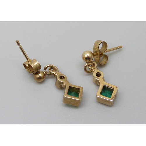 991 - A pair of yellow metal emerald and diamond drop earrings with butterflies marked 375, 1.9g