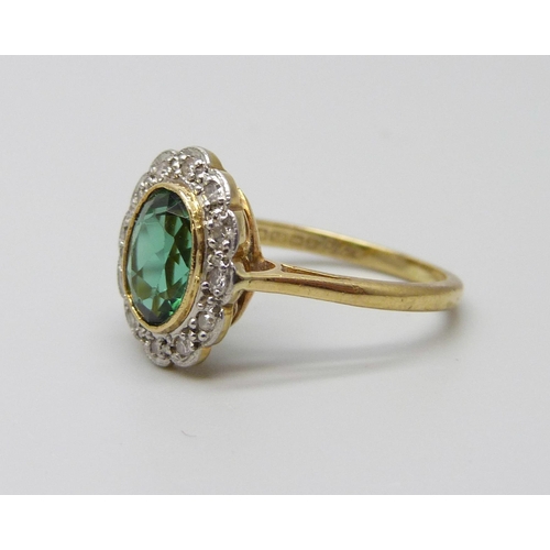 998 - An 18ct gold green tourmaline and diamond cluster ring, 3.5g, M