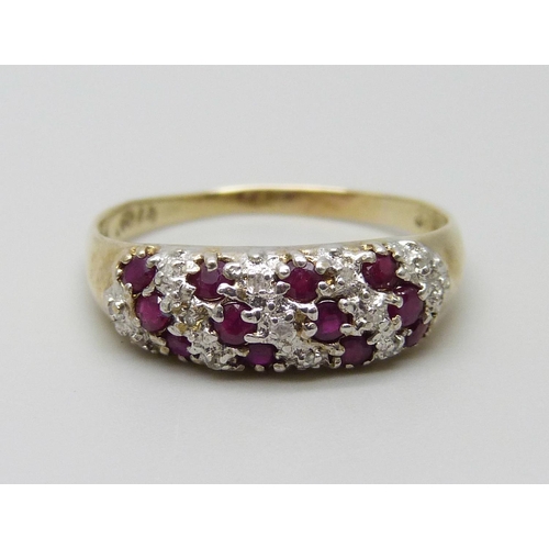 999 - A 9ct gold twelve ruby and thirteen diamond ring, 2.1g, R/S