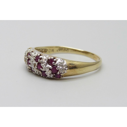 999 - A 9ct gold twelve ruby and thirteen diamond ring, 2.1g, R/S