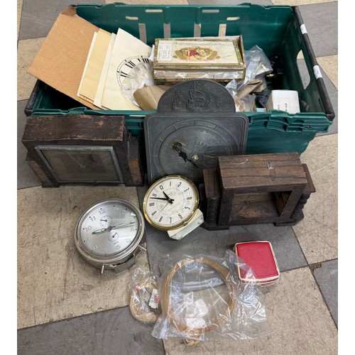 255 - A collection of clocks and spares including clock faces strings, pendulum and dial numbers, etc.