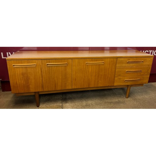 55B - A teak sideboard