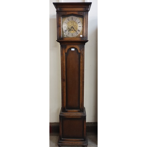 226 - An early 20th Century oak longcase clock