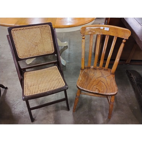 233 - A Victorian elm and beech kitchen chair and a folding bergere chair