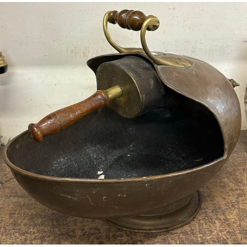 297 - A Victorian brass and copper coal scuttle