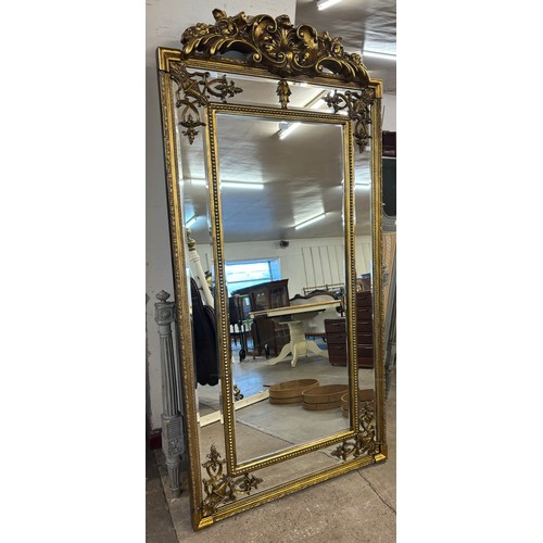 307 - A large French Louis XIV style gilt framed mirror