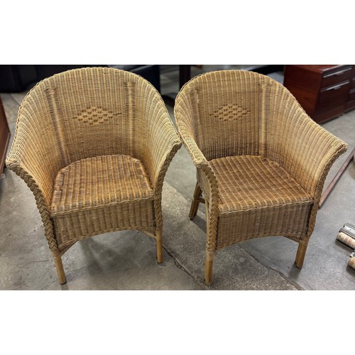 245A - A pair of bamboo and wicker armchairs