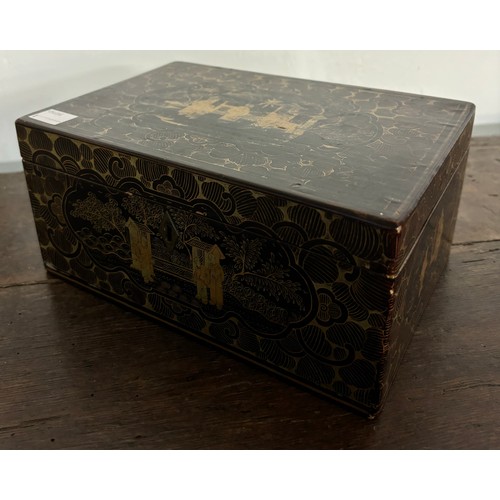 273A - A chinoisere black lacquered jewellery box