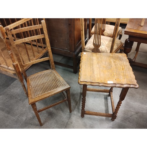 211 - An early 20th Century oak barleytwist occasional table and an oak chair