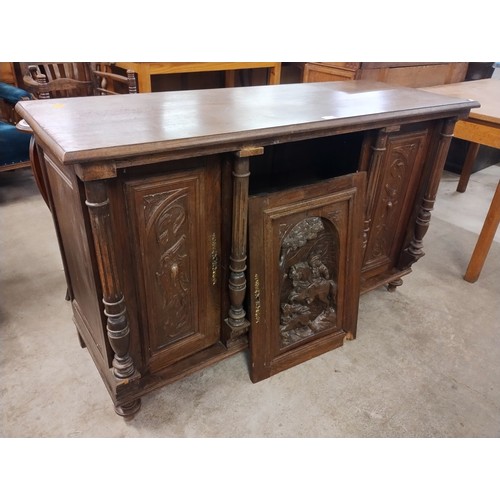 219 - A 19th Century French carved oak sideboard