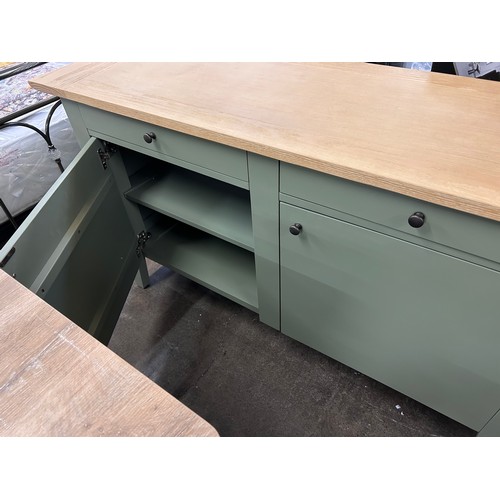 3108 - A large green sideboard