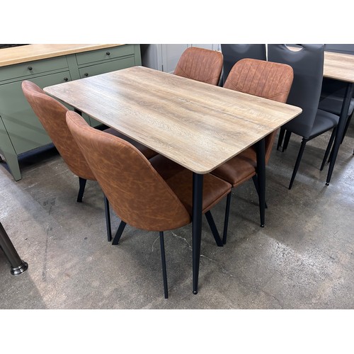 3109 - An Upton table with four Jaden tan chairs