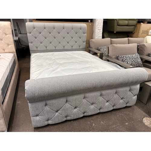 3150 - A pewter button back kingsize bed