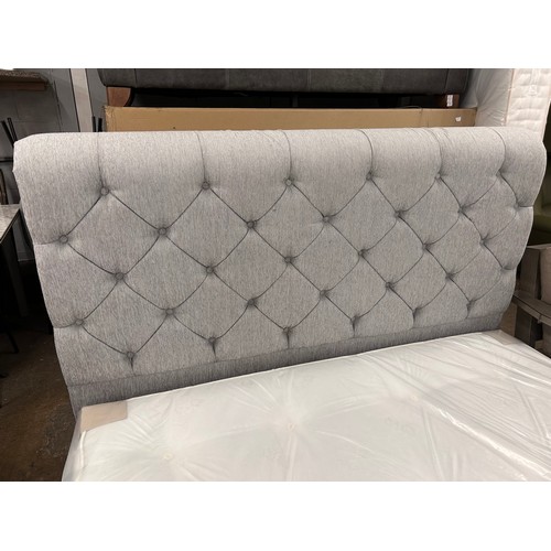 3150 - A pewter button back kingsize bed