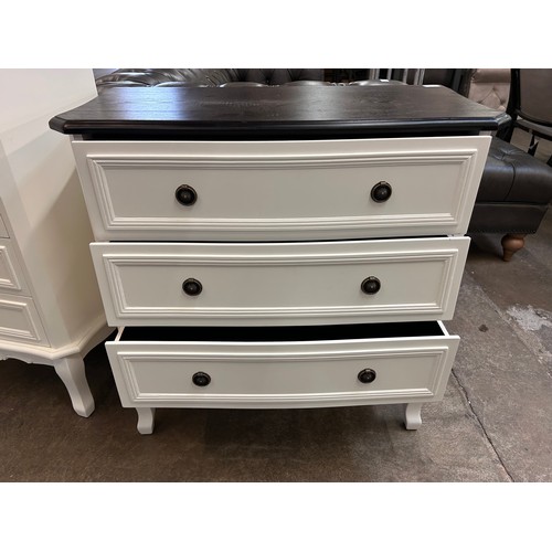 3133A - A chest of drawers with contrasting top