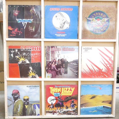 877 - A collection of LP records including The Beatles, AC/DC, ZZ Top, Lynyrd Skynyrd, White Snake, Deep P... 