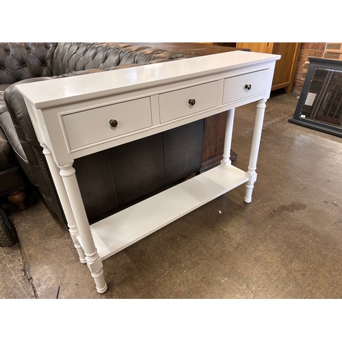 3138 - A white three drawer console table