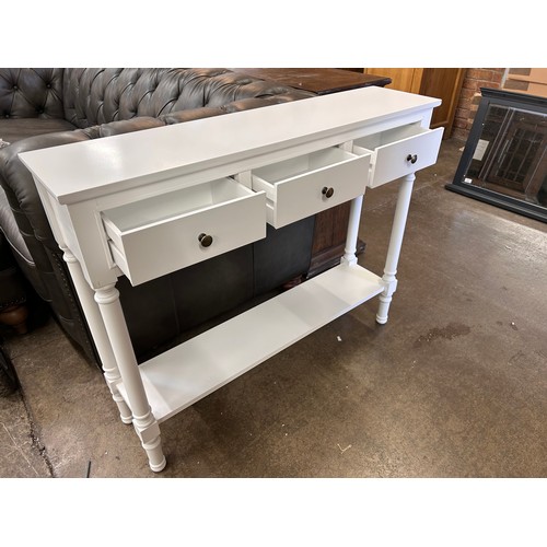 3138 - A white three drawer console table