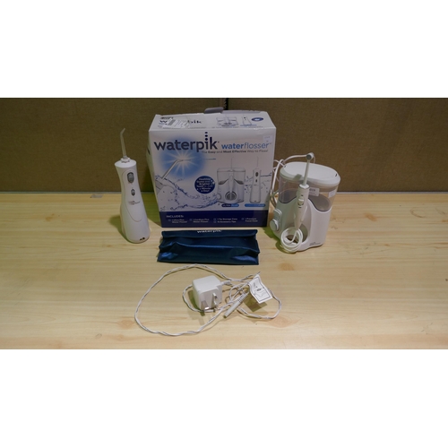 6019 - Two Waterpik Water Flossers  (339-58, 59) *This lot is subject to Vat