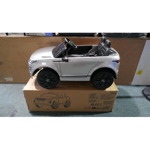 6024 - Land Rover Range Rover Silver & Black Kids Ride on car with box, two keys, charger and parental remo... 