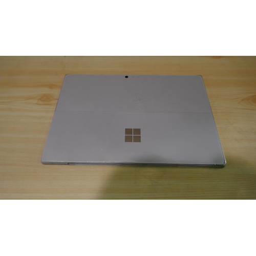 6088 - Two Microsoft Surface Pro Gen 5 tablets (both broken screen/no charging leads)  *This lot is subject... 