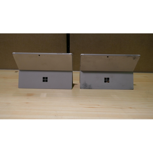 6089 - Microsoft Surface Pro Gen 5 tablet and a Microsoft Surface Pro Gen 7 tablet (both broken screen/no c... 