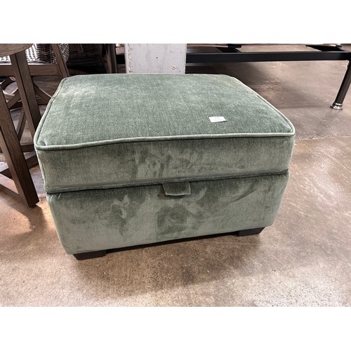 3122 - A emerald green fabric storage footstool